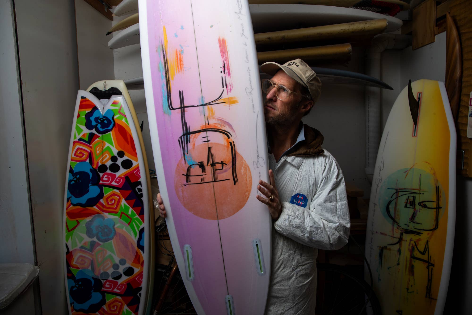 Donald Brink with surfboards from his Realmotionships collection