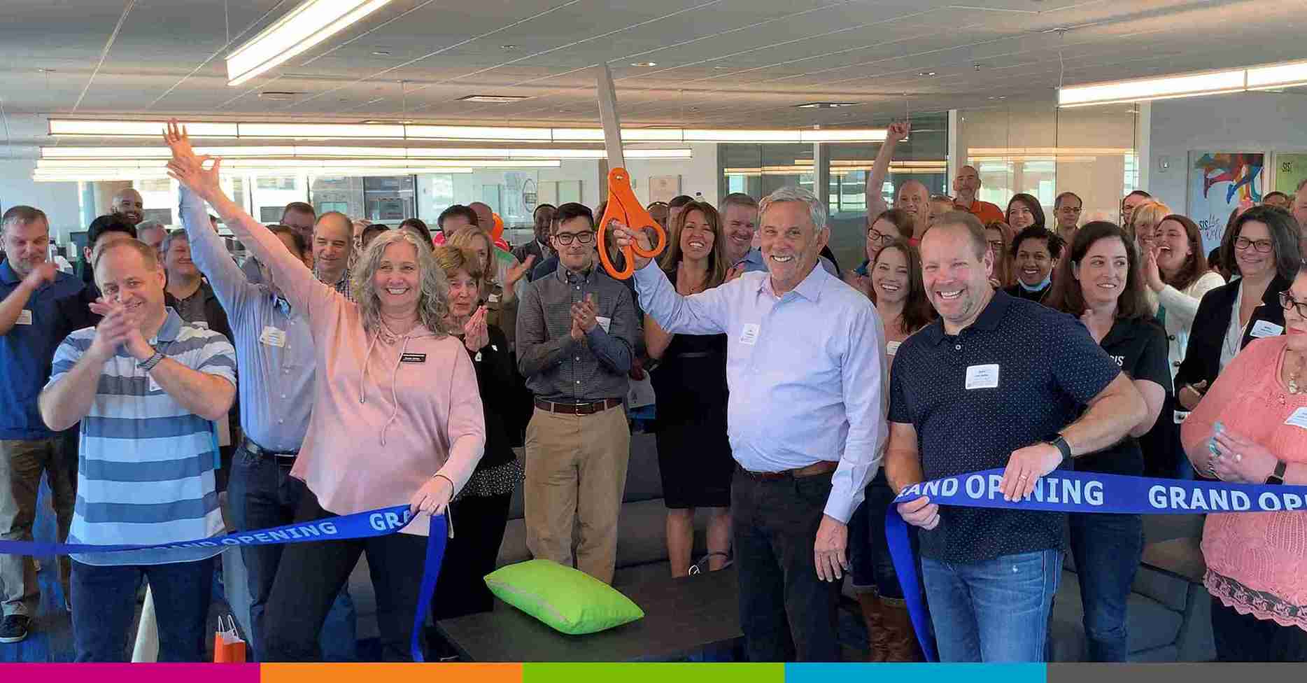 Surgical Information Systems associates gathered at a company office event