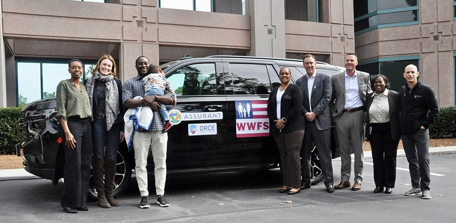 Suzanne Shepherd and Assurant colleagues with Wounded Warriors Family Support at a 2024 vehicle presentation