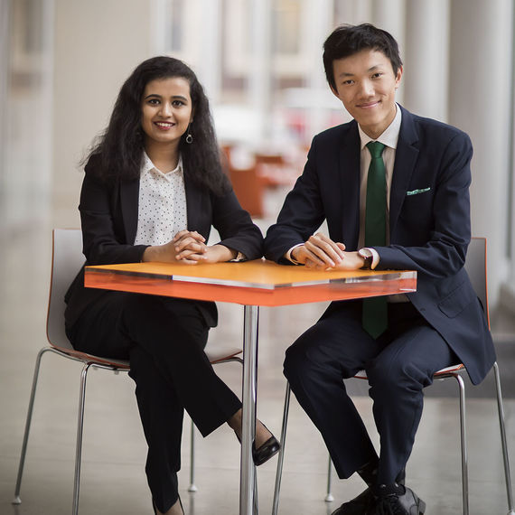 Svanika Balasubramanian and Peter Wang Hjemdahl seated together at a table