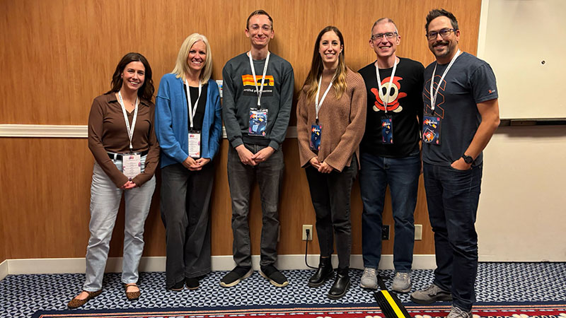 Six Swanson Russell employees together at an industry event