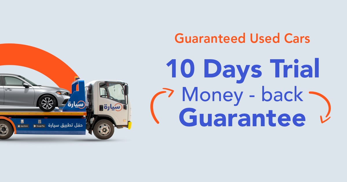 A Syarah branded delivery truck carrying a used car, with the promise of a 10-day money-back guarantee