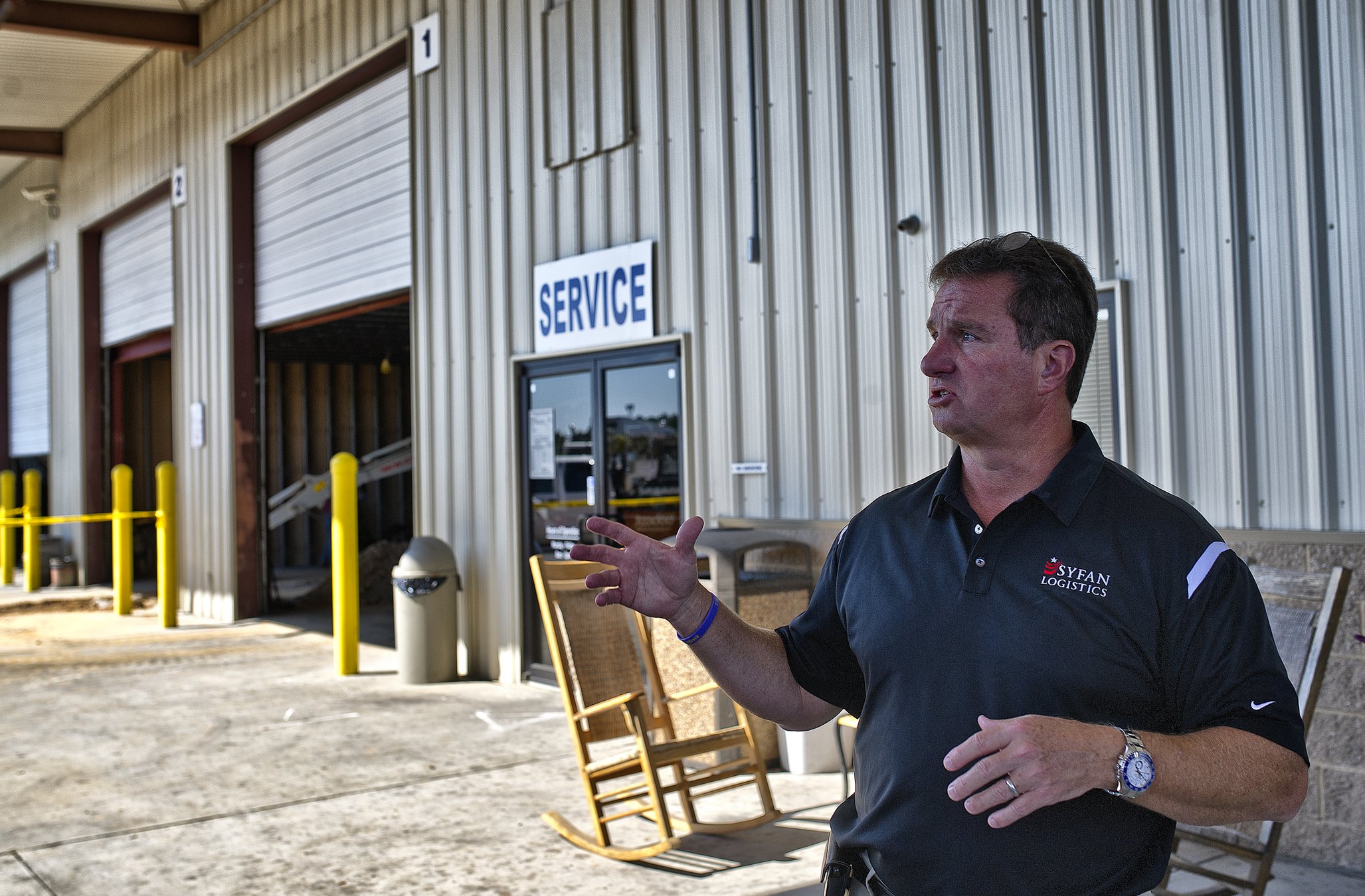 Greg Syfan outside the company’s service building in Gainesville