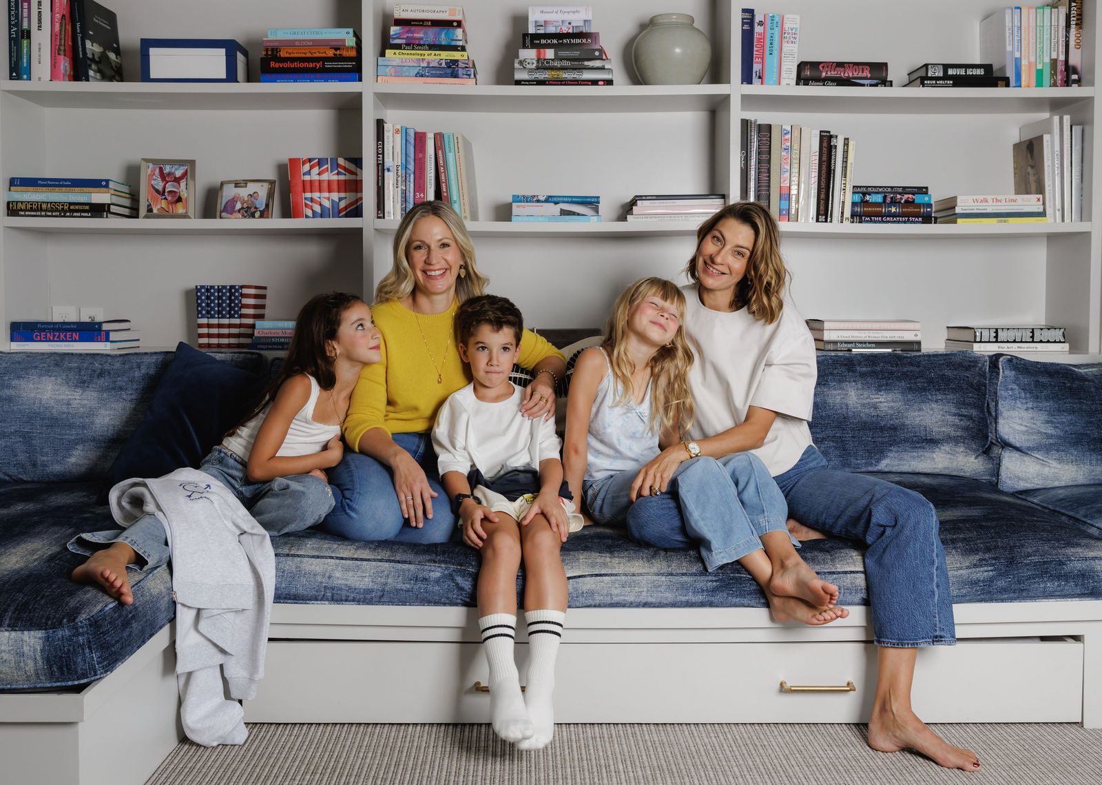 Maisonette president AJ Nicholas and founder Sylvana Durrett sitting with their tween children