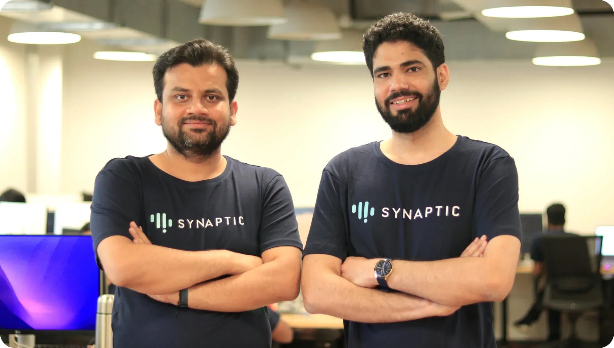 Synaptic co-founders Anurag Abbott and Rohit Razdan standing together