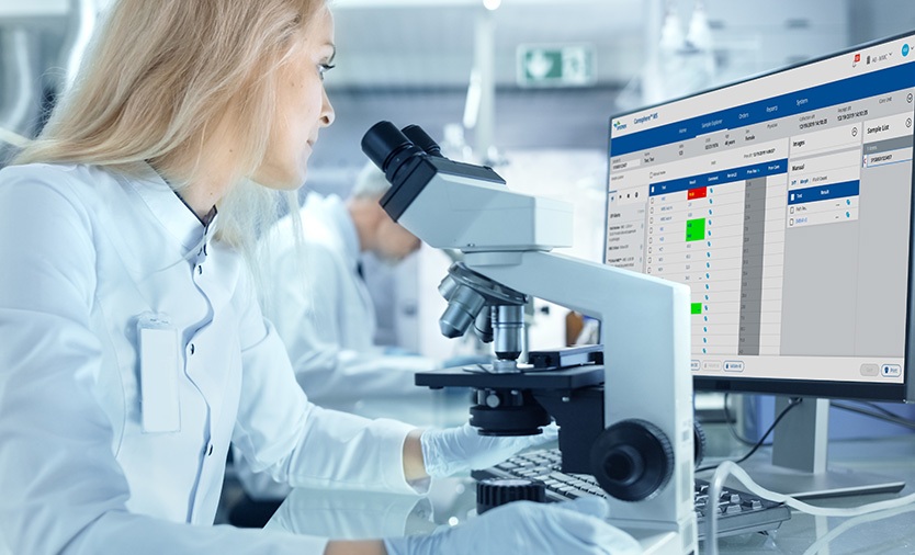 Laboratory professional working with Caresphere workflow software