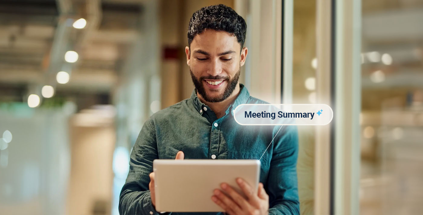 A site survey professional using a tablet with a meeting summary label