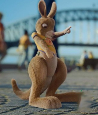 Ruby, Tourism Australia’s animated kangaroo, poses beside Sydney Harbour