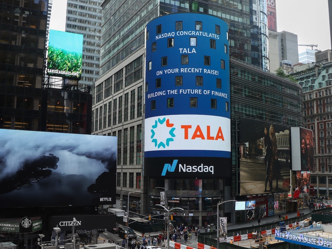 A Nasdaq billboard congratulating Tala on a funding round