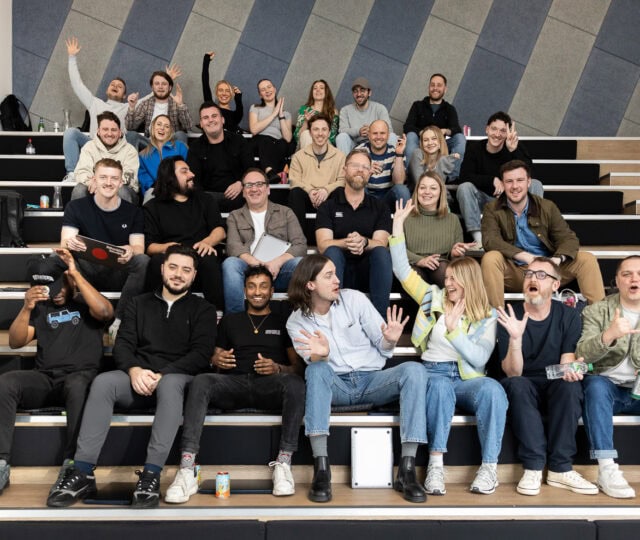 Talentful colleagues gathered together on tiered seating