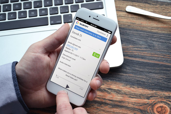 Archival Talentify mobile interface showing a candidate profile, fit score and upcoming interview