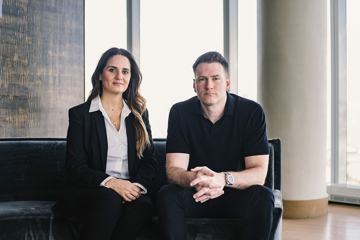 Talkiatry co-founders Georgia Gaveras, left, and Robert Krayn seated together