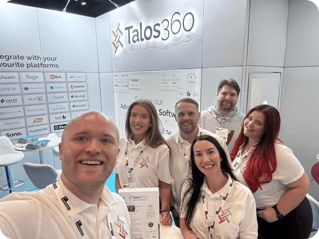 Six Talos360 team members at the company’s CIPD 2025 exhibition stand