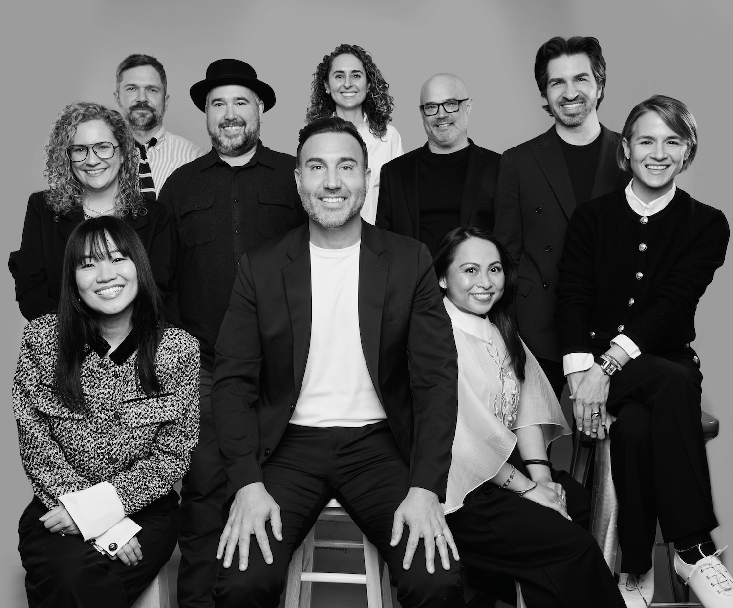 Tamara Group leadership team in a black-and-white studio portrait