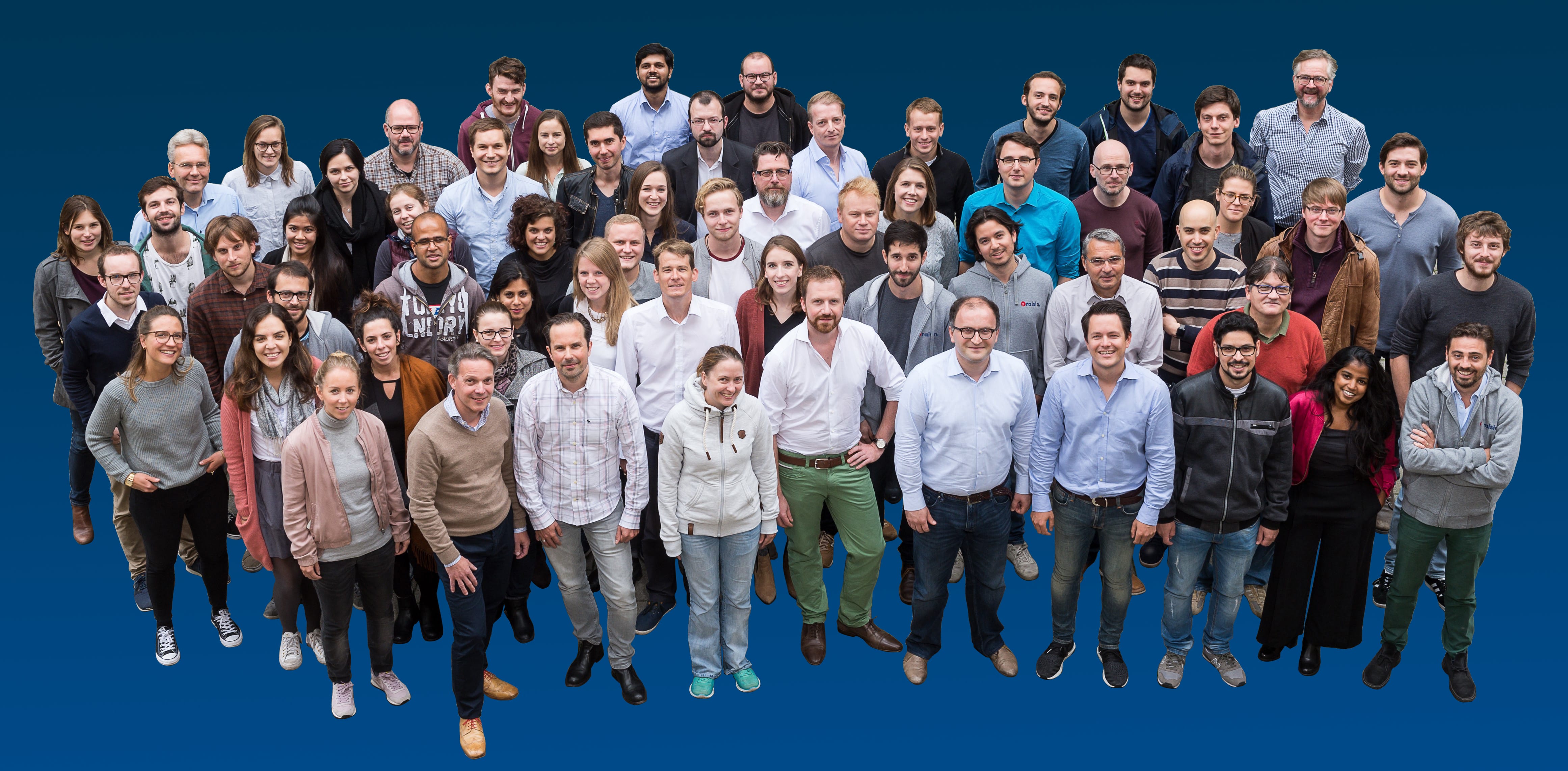 Tamaz Georgadze with the Raisin team in a group photograph