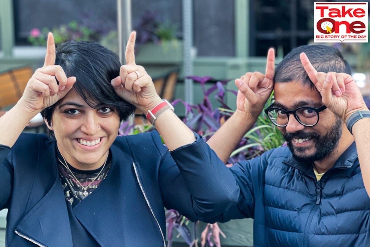 Hasura co-founders Rajoshi Ghosh and Tanmai Gopal smiling and making playful horn gestures