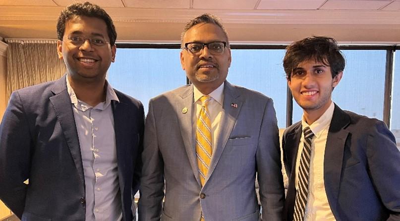 Tanmay Thaker, right, with Utkarsh Patel and Bharat Patel at a hospitality trade event