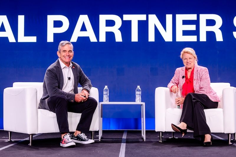 Tara Ryan and Dan Streetman seated onstage during Tanium Converge 2025