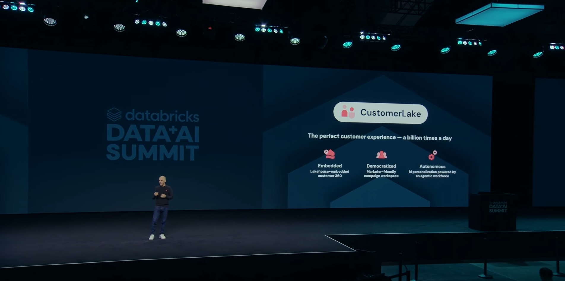 Tasso Argyros presents CustomerLake on a conference stage in 2026