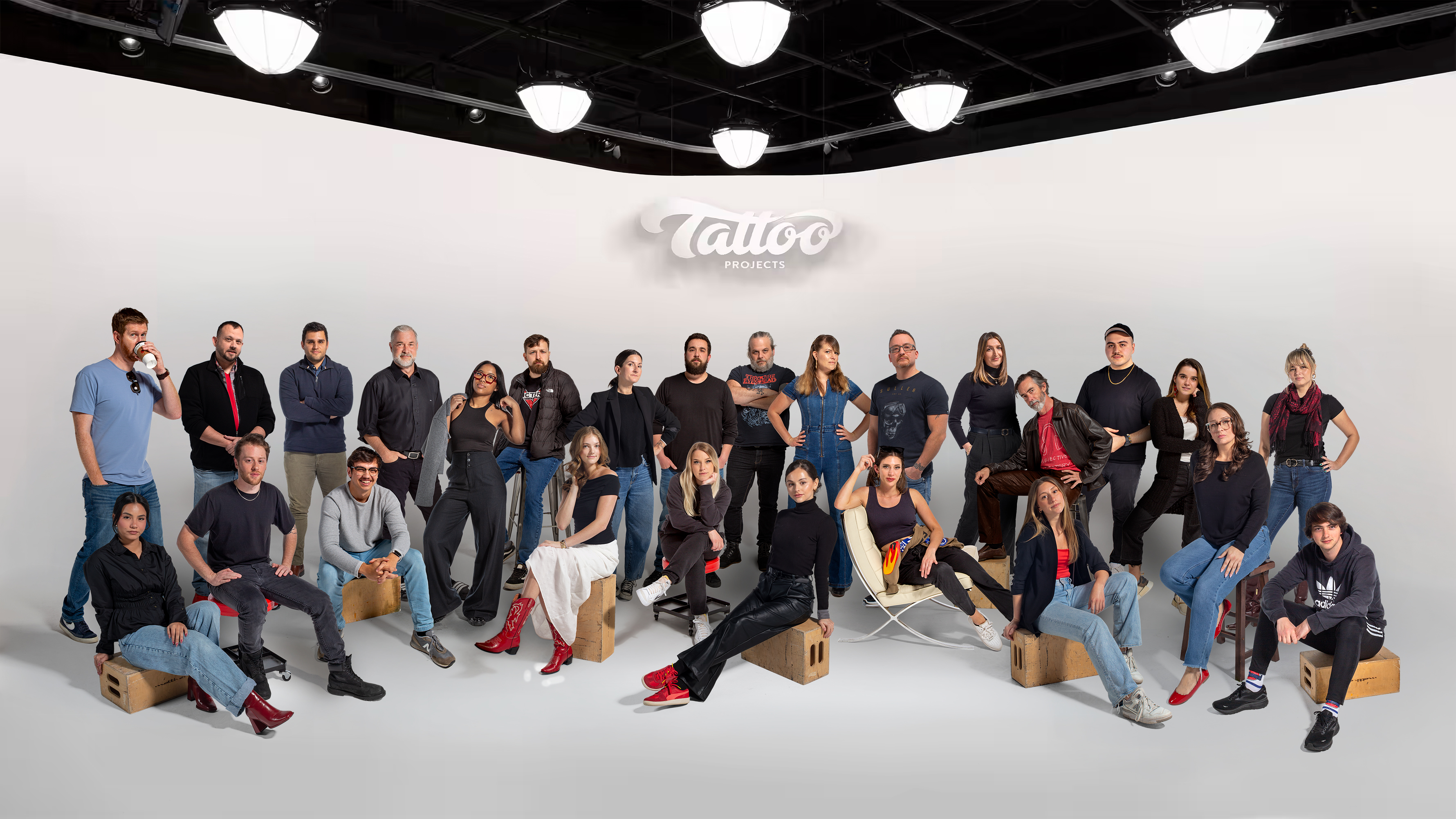 Tattoo Projects team posing together inside its production studio
