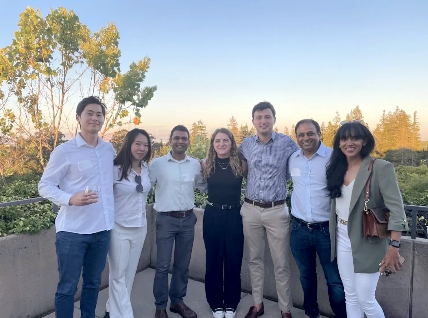 A group photographed outdoors, as featured on Tau Ventures’ company website