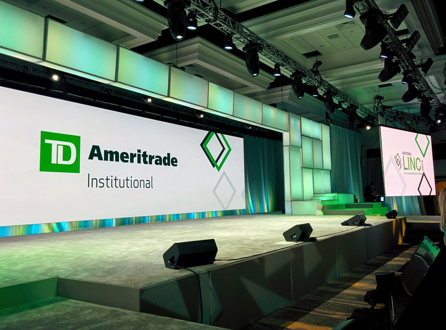 The green and white National LINC 2015 conference stage