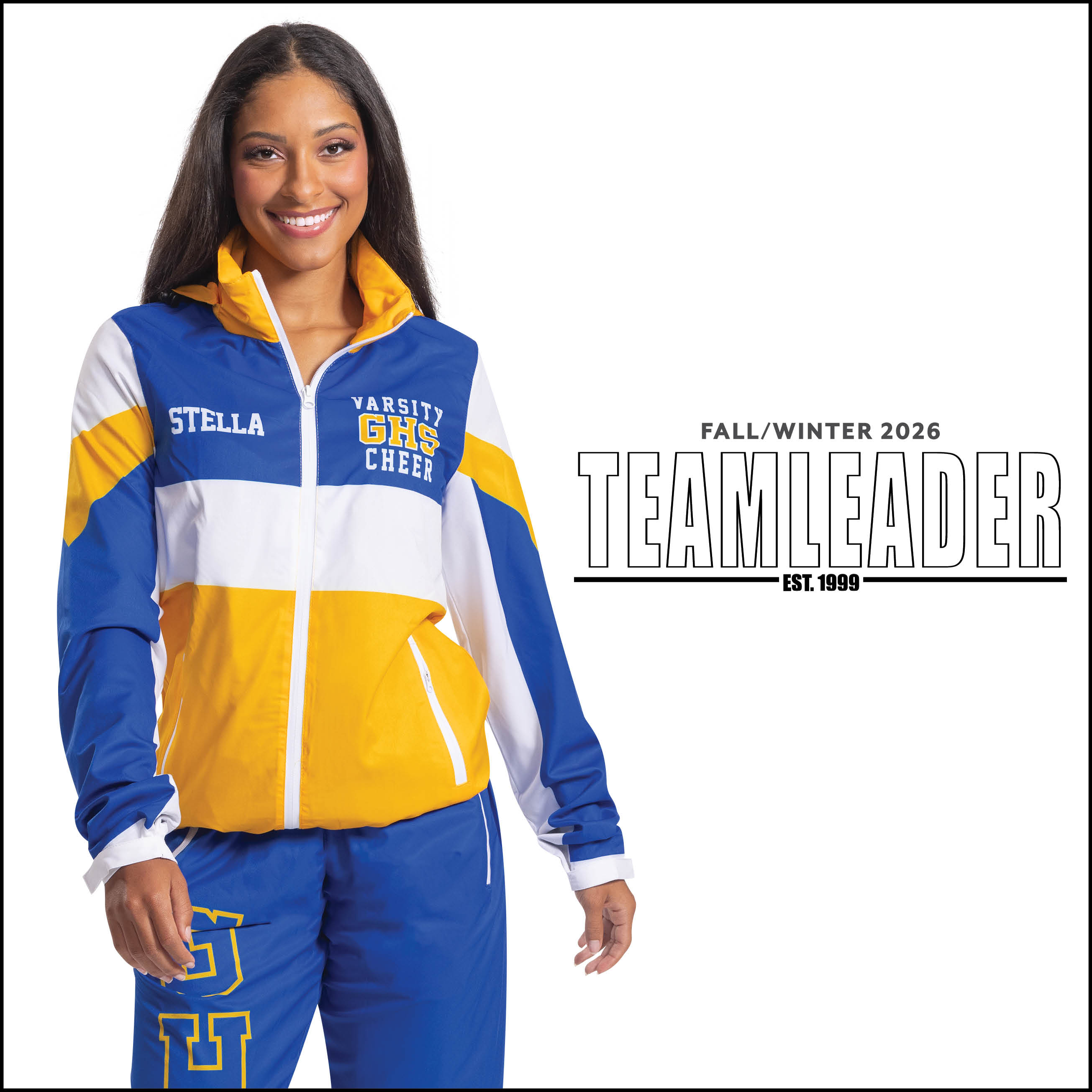 TeamLeader Fall and Winter 2026 catalog model in a blue, yellow, and white warm-up suit