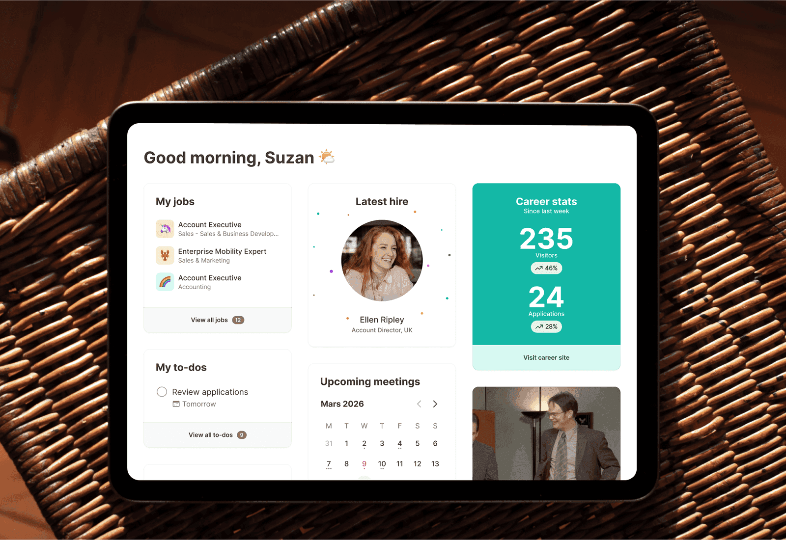 Teamtailor dashboard displayed on a tablet, showing jobs, a recent hire, career statistics, tasks and meetings