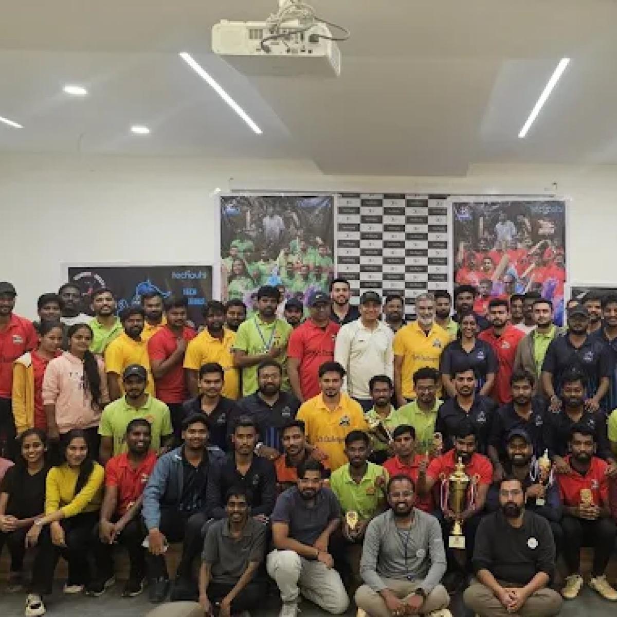 Techouts colleagues gathered for a group photograph in an office