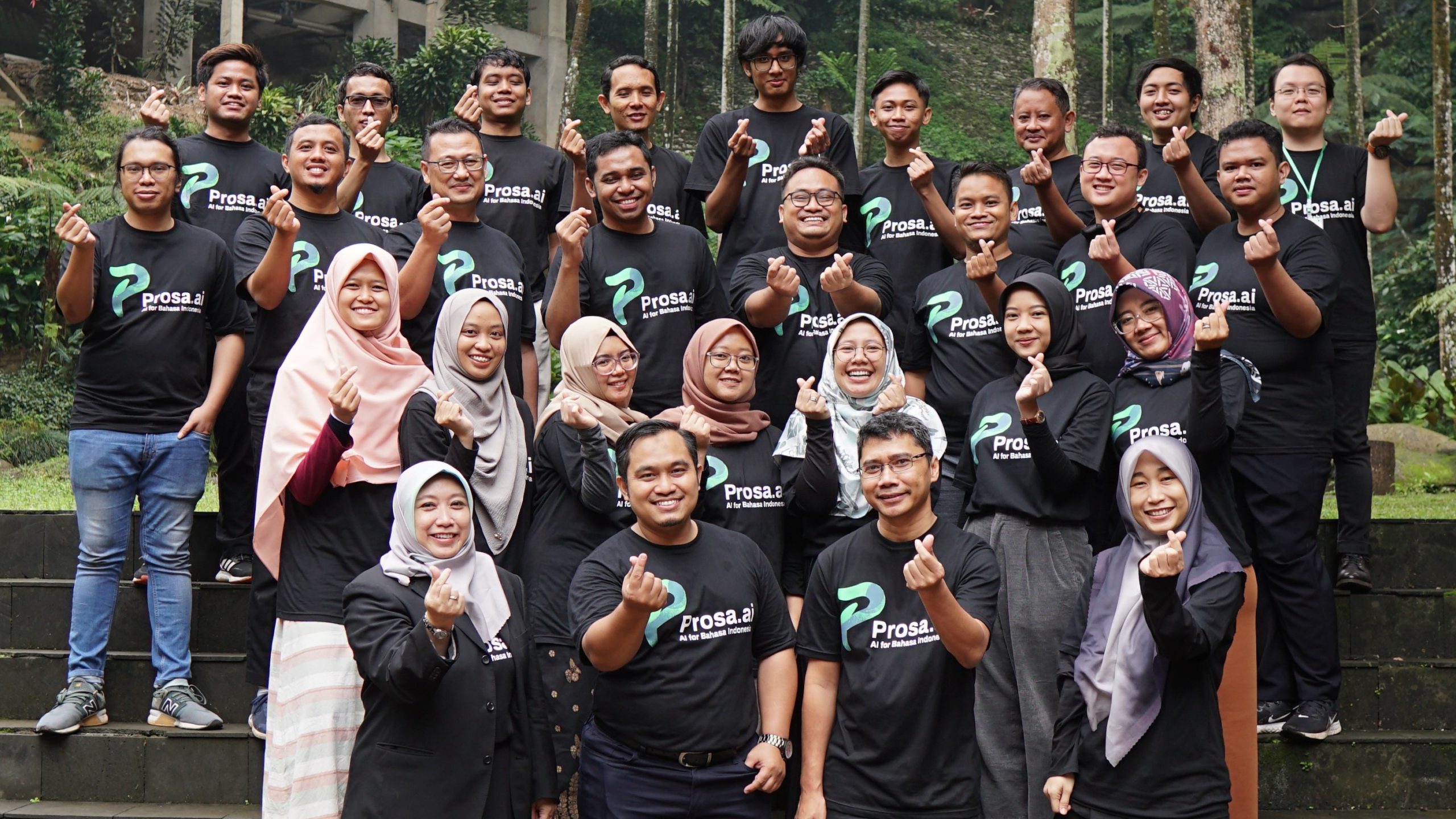 The Prosa.ai team posing outdoors in matching company T-shirts