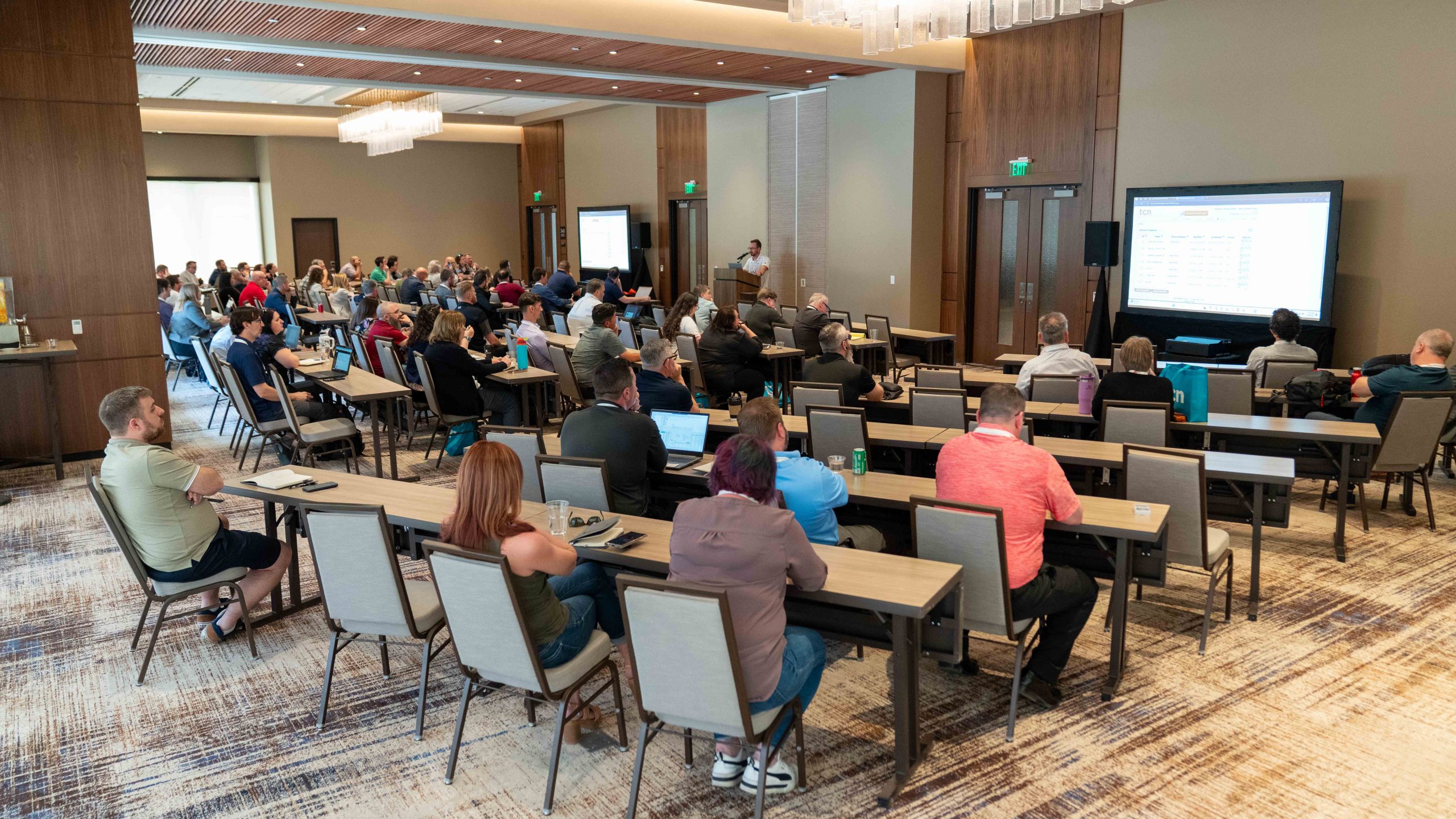 Attendees seated around tables at TCN’s C3 2025 user conference