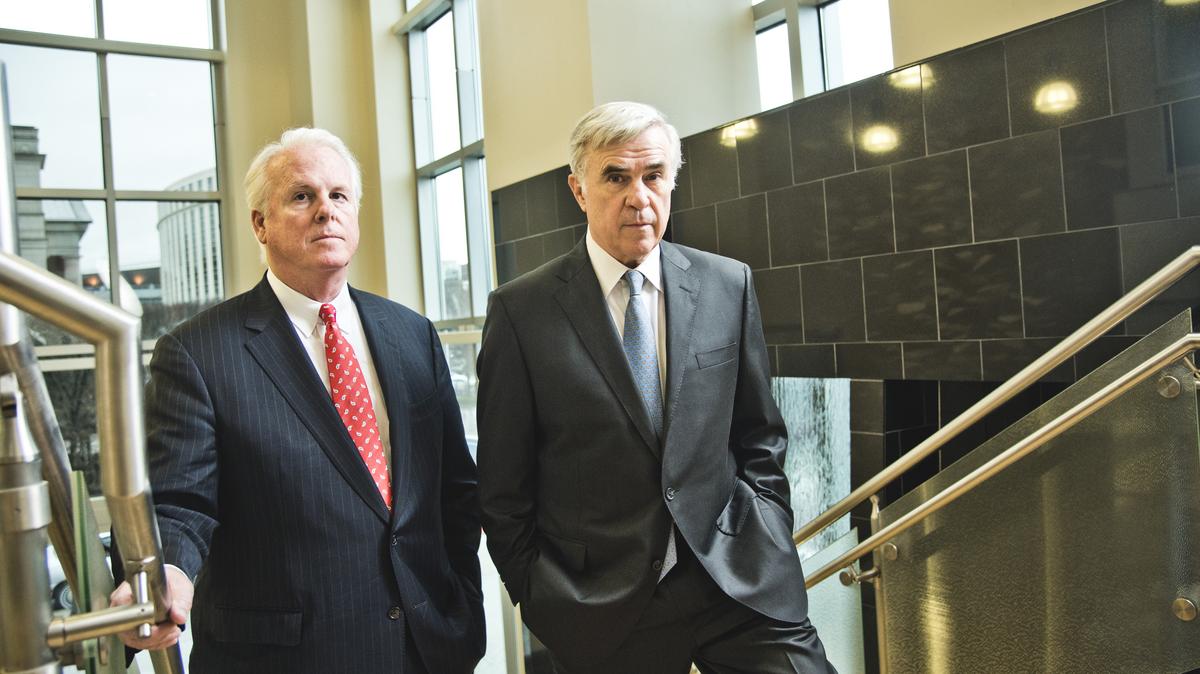 Terry Turner, left, and Rob McCabe on an office staircase