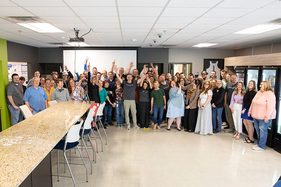 Terryberry employees gathered together in an office common area