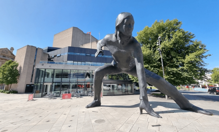 A large outdoor sculpture outside Theatre Royal Plymouth