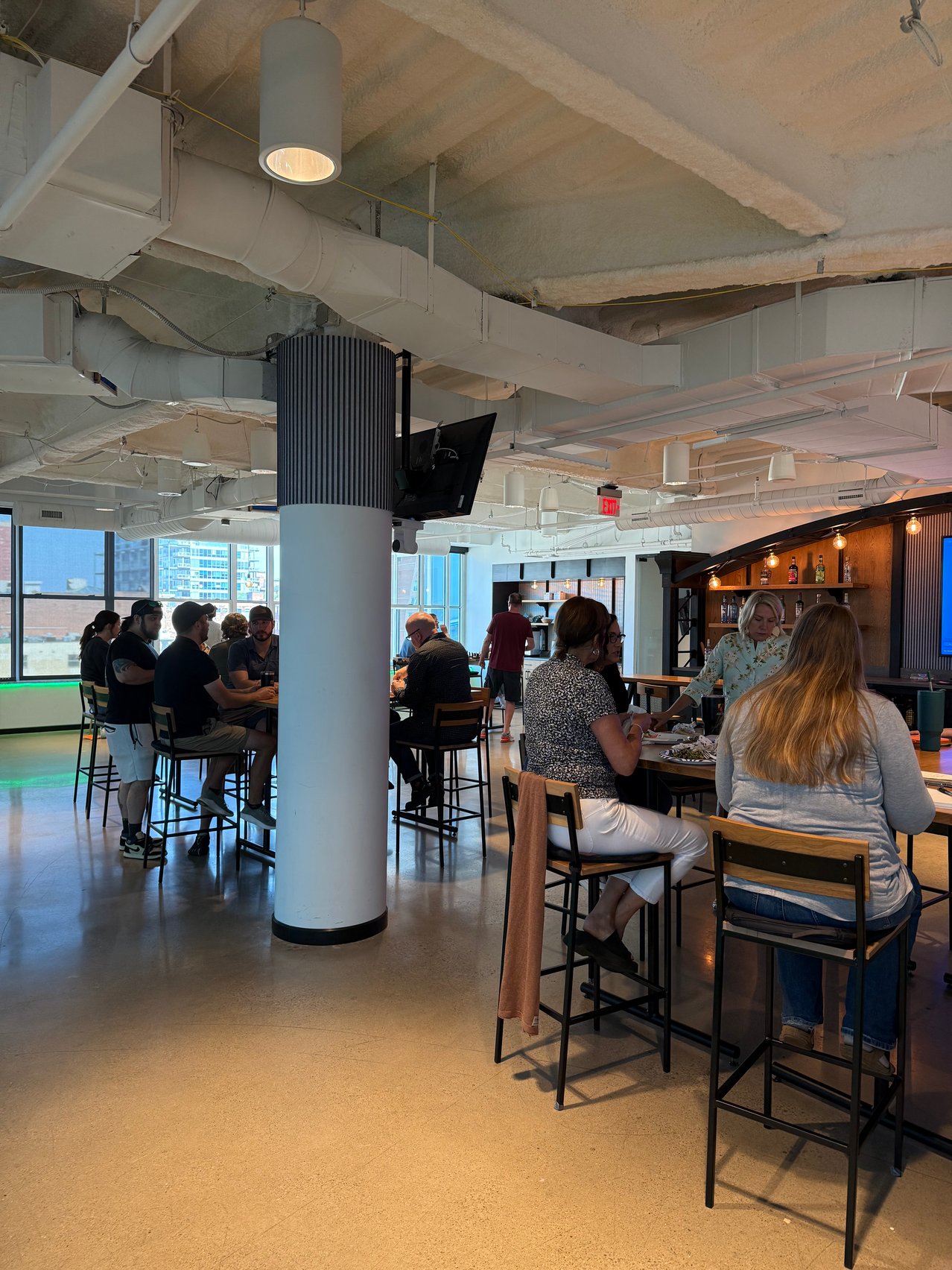 Adcom team members gathered inside the Cleveland office