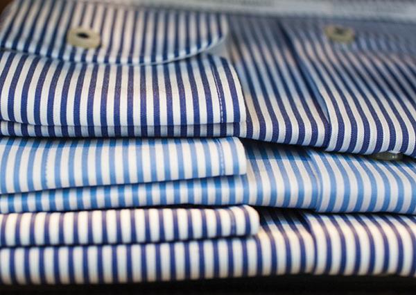 Striped dress shirts pictured in The Custom Shop’s collection