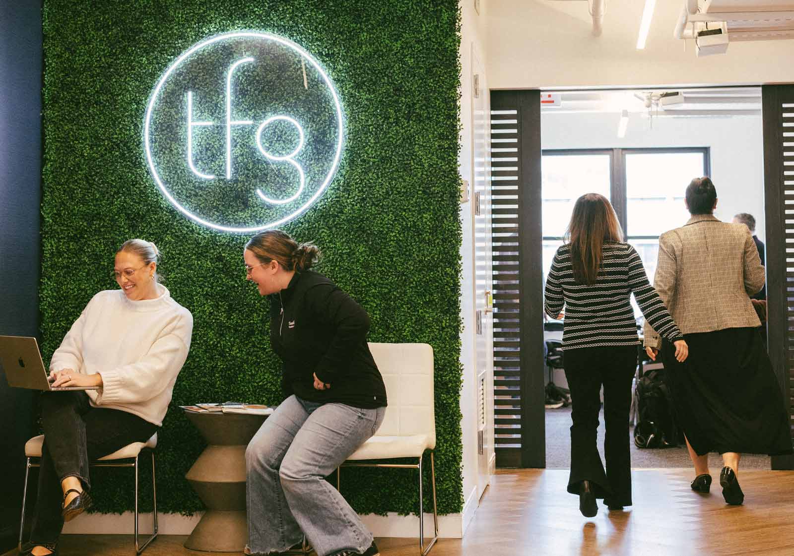 The Food Group office wall with the agency name in dimensional lettering