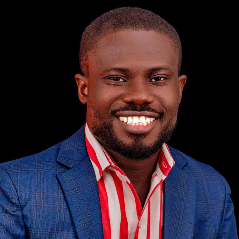 Portrait of The Growth Hub founder Victor Adeoluwa Olatunde in a blue jacket