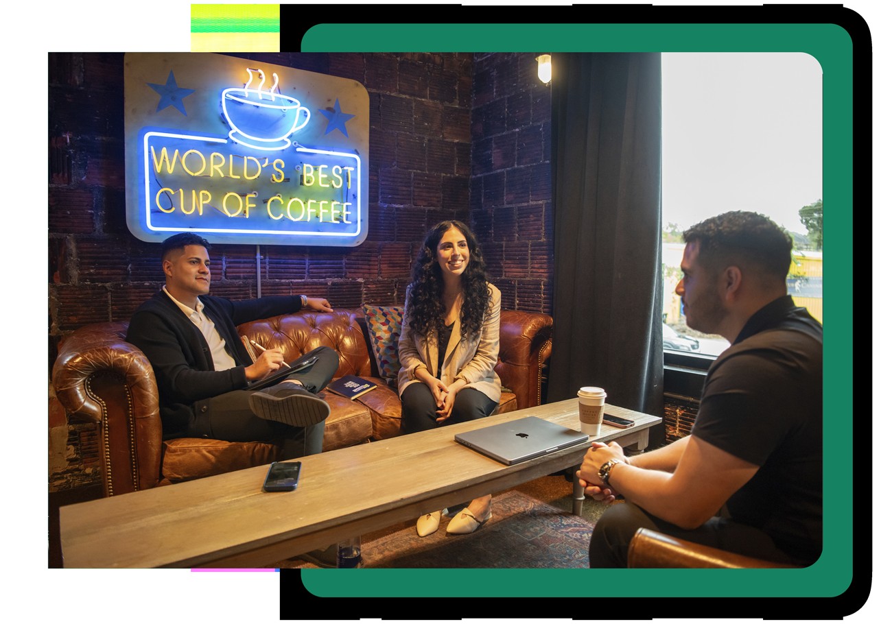 The Idea Farm team in a meeting with company leadership