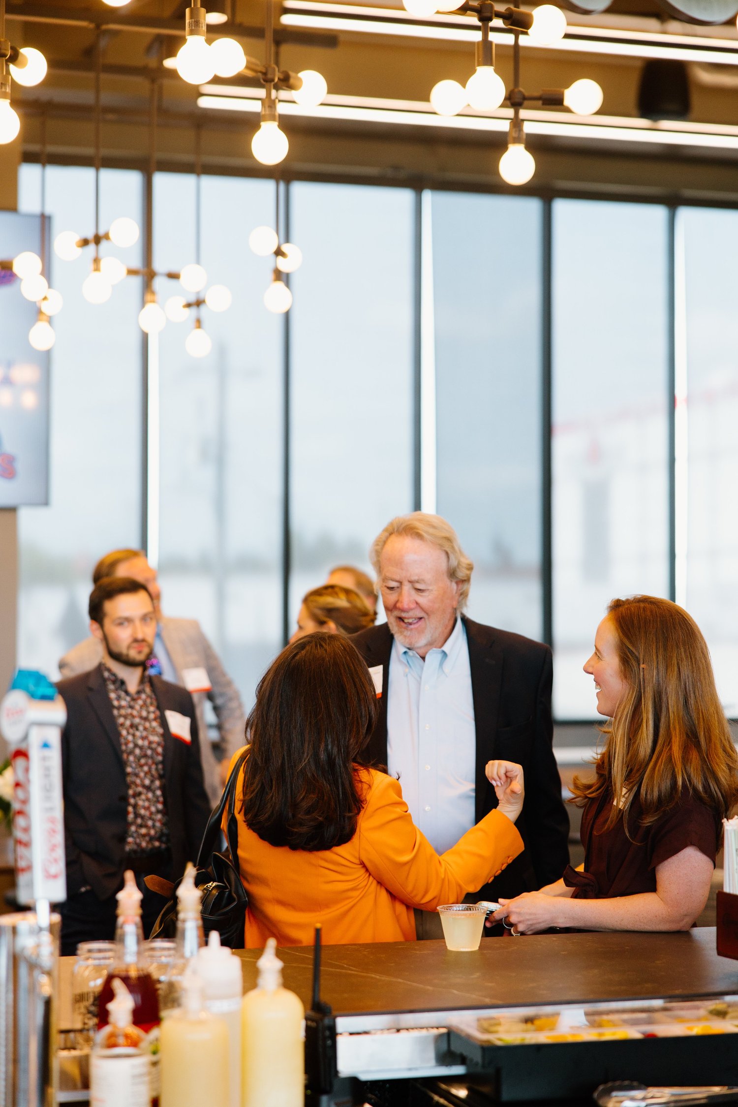 Tom Ingram speaking with guests at a Tennessee Business Forum gathering