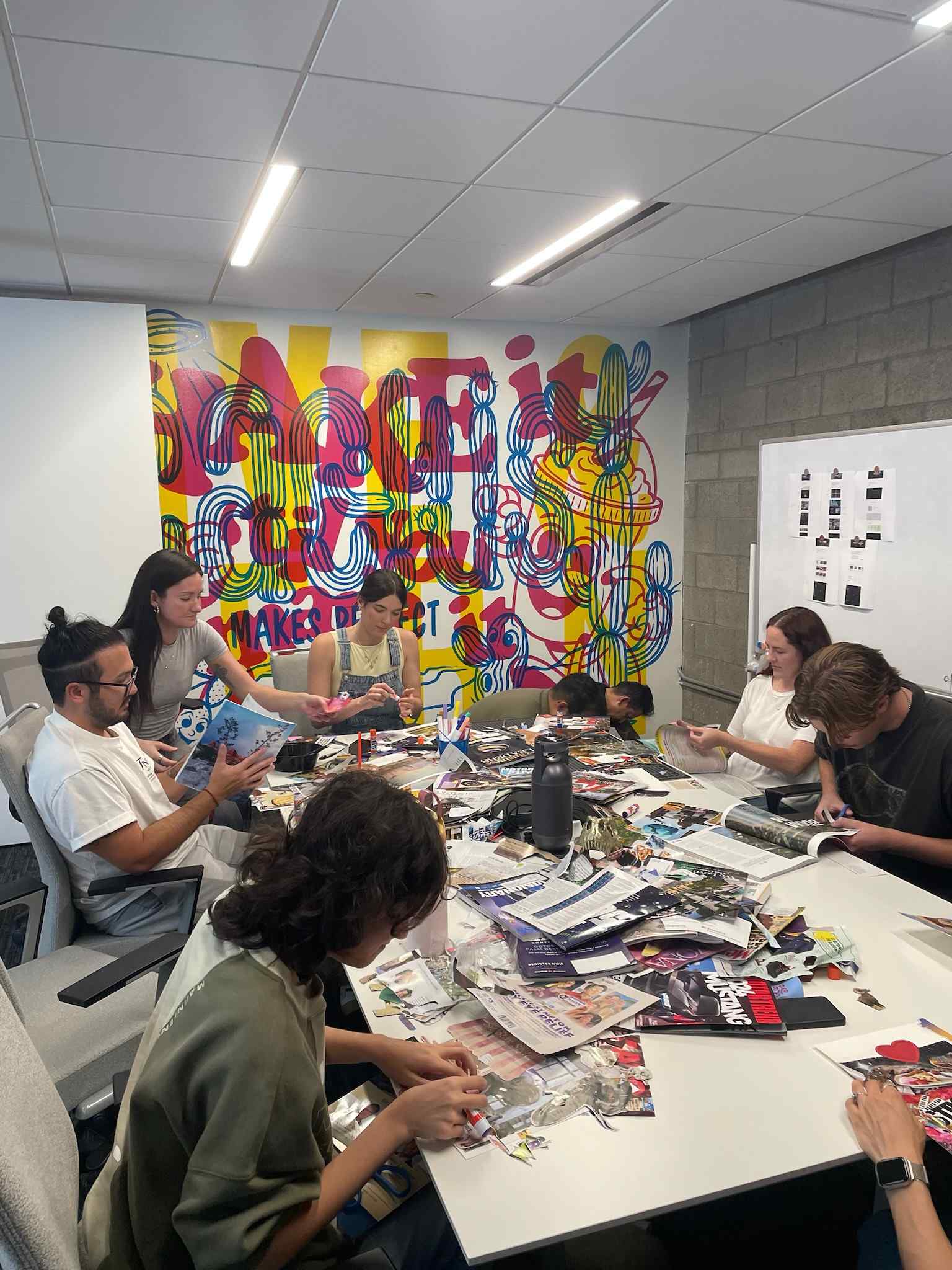 The James Agency team collaborating around a table
