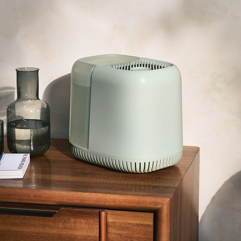 A Canopy humidifier displayed on a bedside table