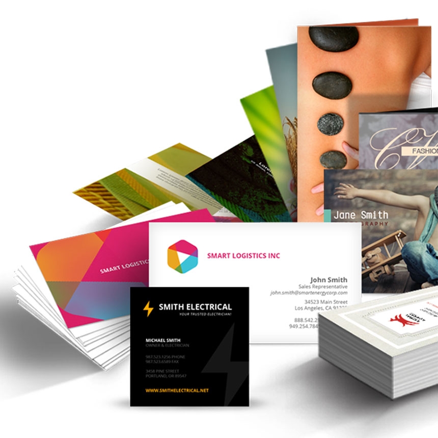An assortment of business cards, brochures and printed promotional pieces