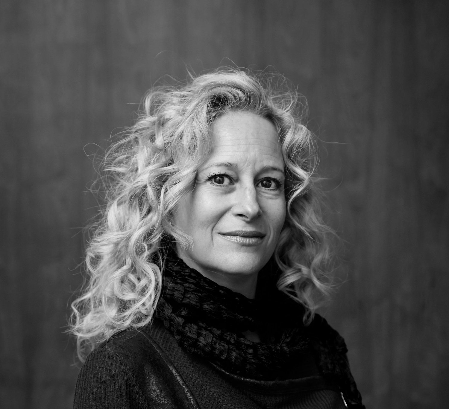 Black-and-white portrait of The Sage Group founder Cara France