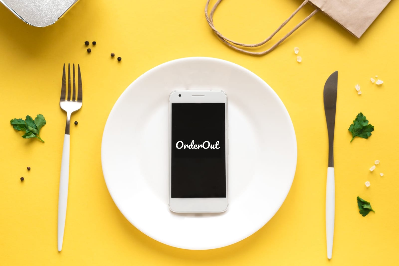 OrderOut promotional image with a phone on a plate against a yellow background