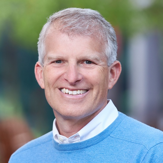 Matt Abrahams smiling in a blue sweater