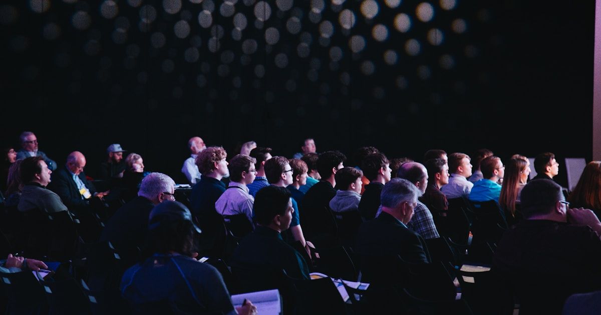 Audience watching ThinkingAI's 2026 launch event at the Computer History Museum