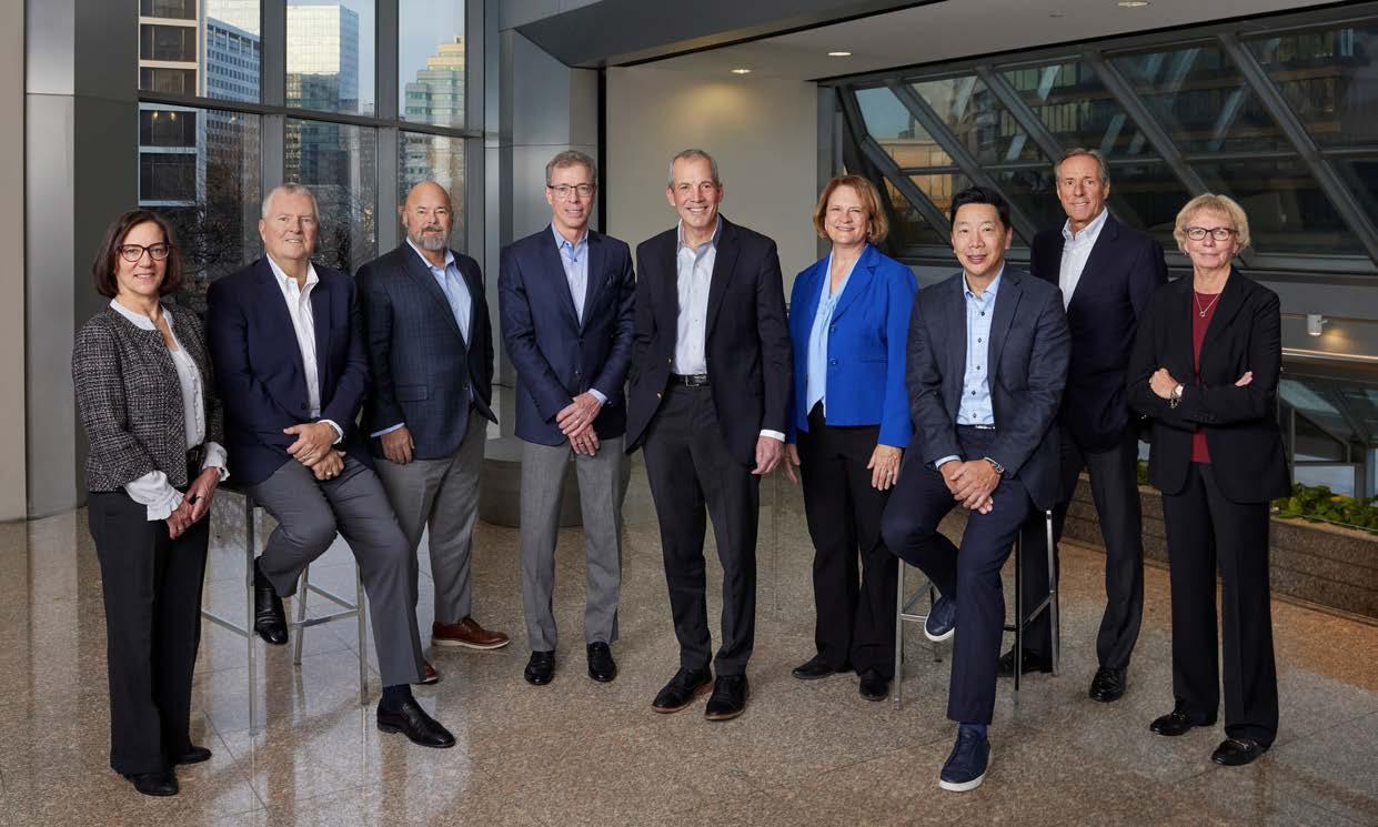 Hexcel board members gathered indoors, with Thomas Gentile standing at the center