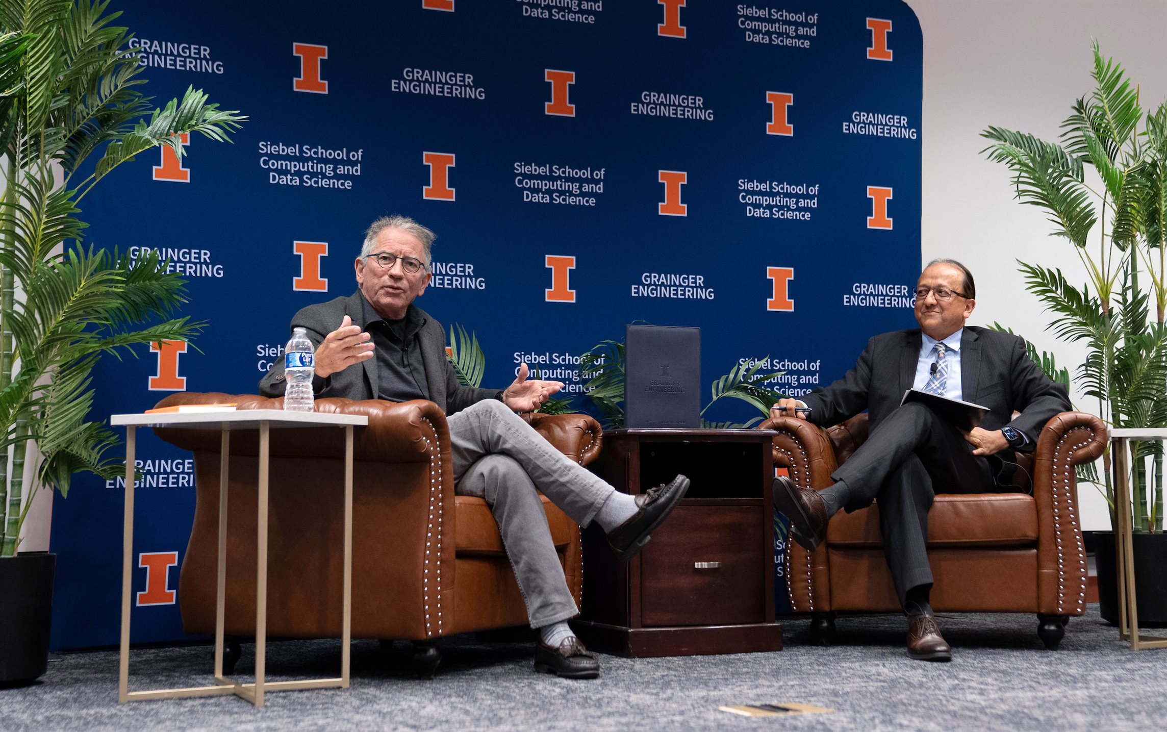 Thomas Siebel and Grainger Engineering dean Rashid Bashir speaking in armchairs at the Illinois school dedication