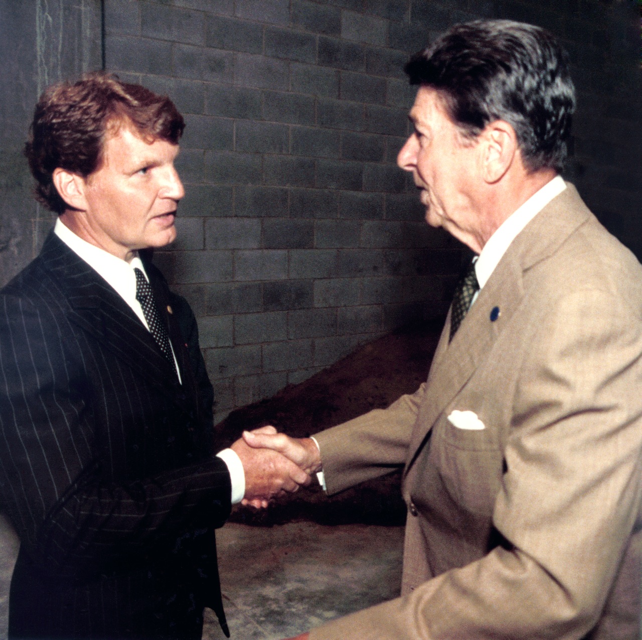 Thomas Nies, on the left, shakes hands with President Ronald Reagan.